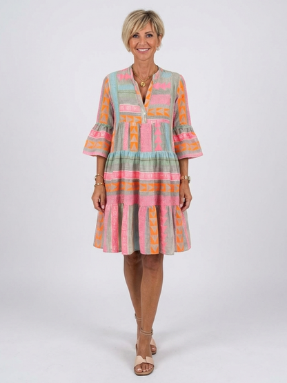 Maelle | Geometric Print V Neck Tiered Knee Length Dress