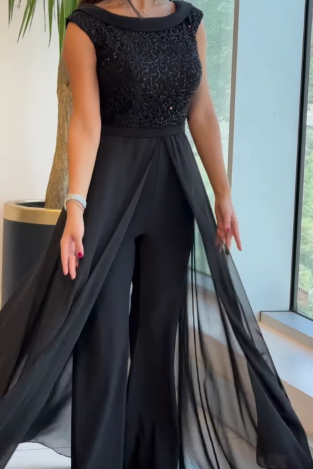 Women's Sleeveless Jumpsuit in Black - image 3