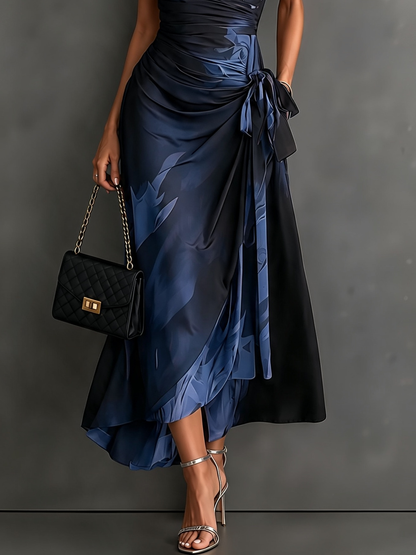 Rosanna | Midi dress with abstract print, V-neck, short sleeves, belt and asymmetric hem with frill.
