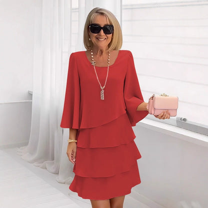 Maria – Elegant midi dress with frills